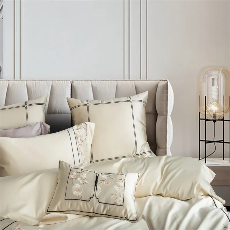 Beige decorative pillows in a bedroom setting