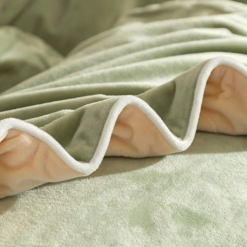 Close-up of a soft, green blanket with white trim 500TC Reversible Fluffy Microfiber Duvet Cover Set with Sheets and pillowcases