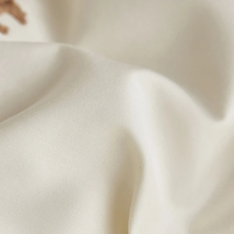 Close-up of beige fabric with a soft texture