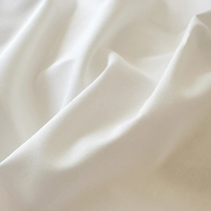 Close-up of white fabric with folds