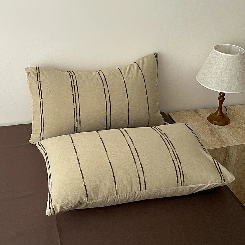 Close up of 400TC Cotton Yarn-Dyed Beige Stripe Pillowcases with coffee sheets