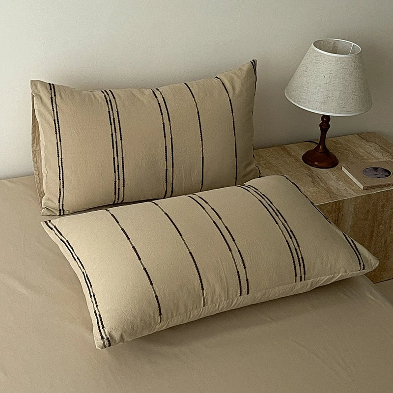 Close up of 400TC Cotton Yarn-Dyed Stripe pillowcases with sheets and duvet cover